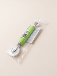 Andrückrolle in der Originalverpackung mit Etikett und Anleitung